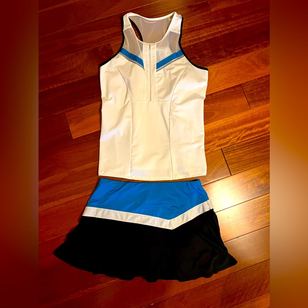 Two piece tennis. Large tank, medium skirt.